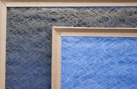 Side-by-side comparison of a dirty versus a clean AC air filter