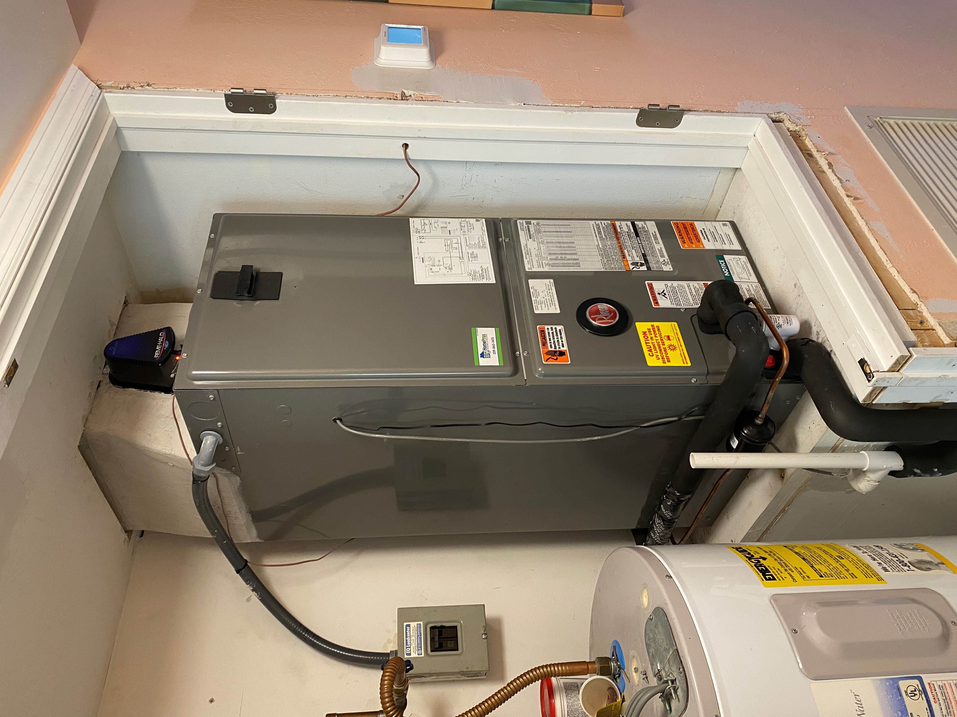 New Rheem air handler installed clean by HomePros Cooling and Heating