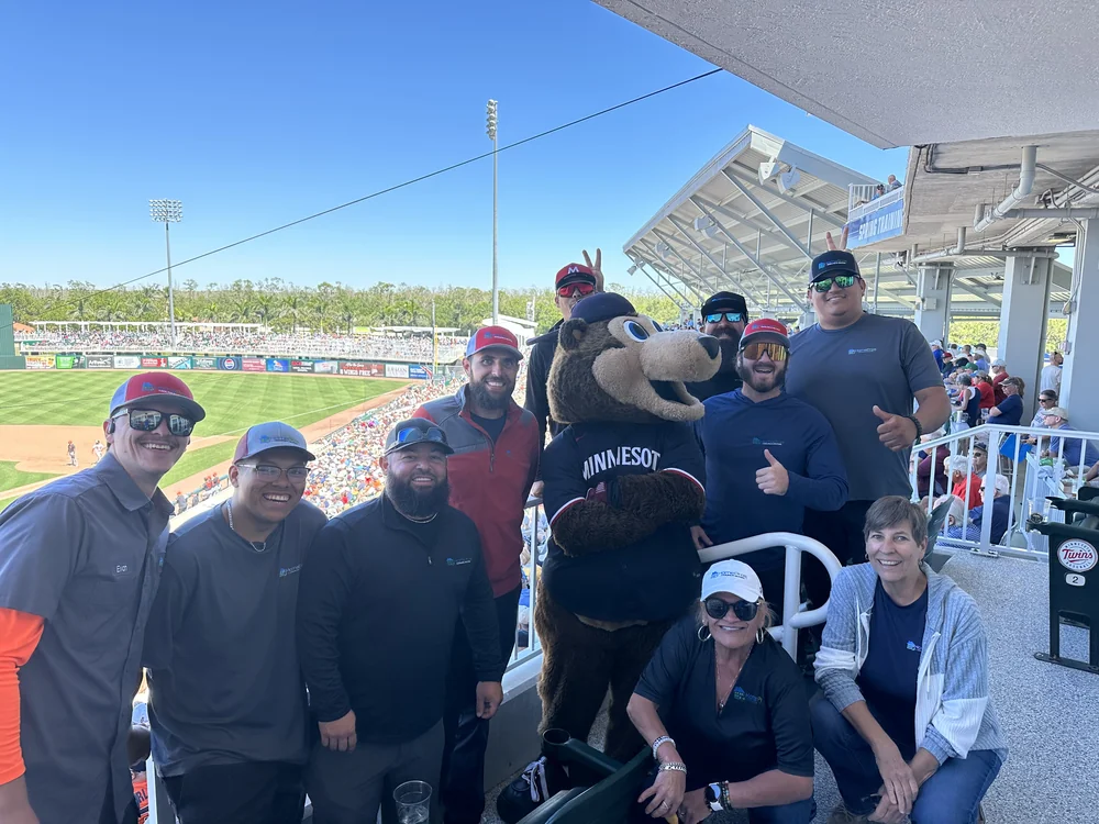 The HomePros Cooling & Heating team — Tyler, Alex, and the crew at Hammond Stadium