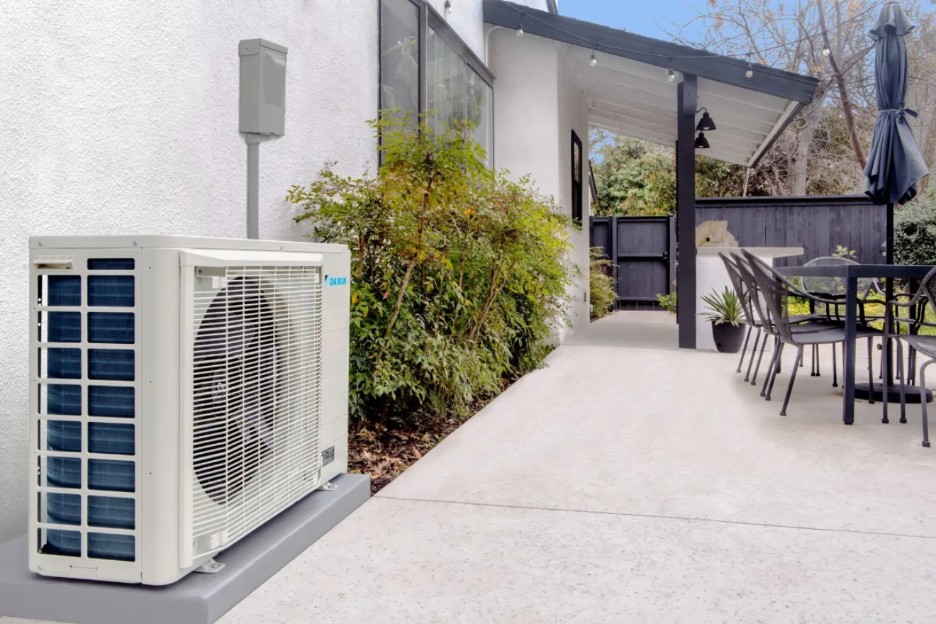 HomePros technician diagnosing an air conditioning system in Southwest Florida